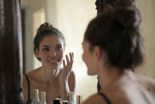 Woman Looking In Mirror Smiling Body Positivity
