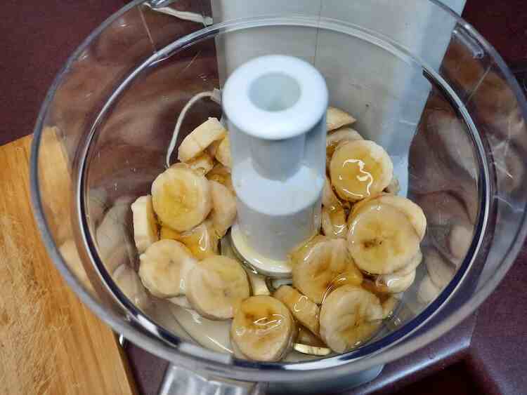 Banana "nice" cream Ingredients in a food processor