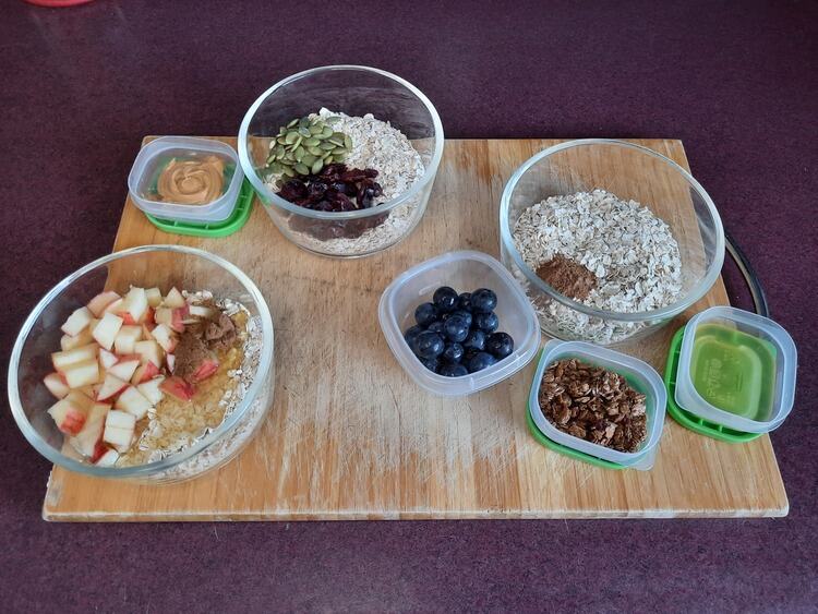 The three Oatmeal Bowls Before Cooking. Apple Cinnamon Pie, Cranberry and Protein, and Blueberry Crumble.